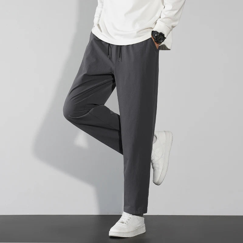 Pantalon Harun pour hommes en tissu de montagne Confortable et décontracté Printemps Automne Hiver Mode coréenne Tendance jeunesse Pantalon élastique