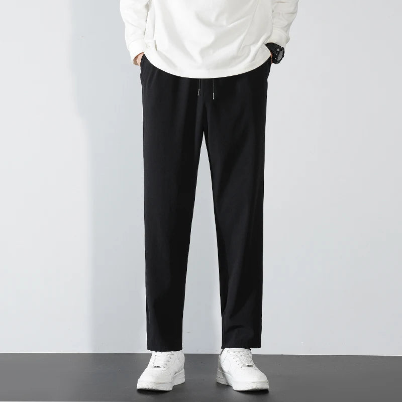 Pantalon Harun pour hommes en tissu de montagne Confortable et décontracté Printemps Automne Hiver Mode coréenne Tendance jeunesse Pantalon élastique